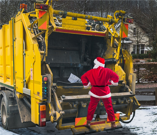 Image: a dustcart with santa collecting recycling