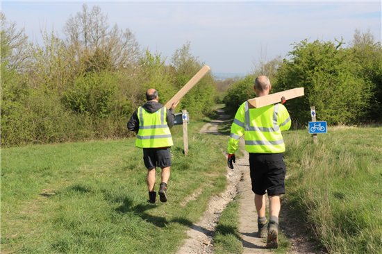 Replacement wooden posts in readiness for new signage on Epsom & Walton Downs