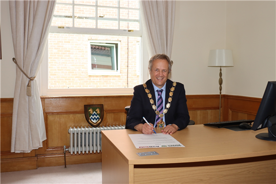 Cllr Clive Woodbridge, Mayor of EEBC signing ASB pledge